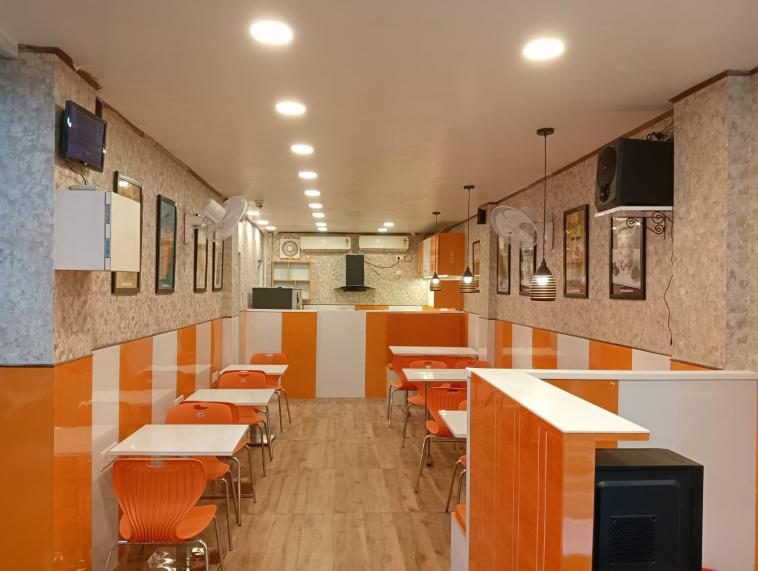 Tea Junction signature orange-and-white interior