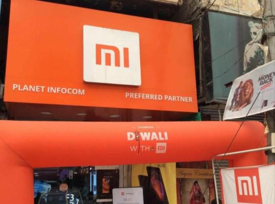 Mi store fit-out and branded arch